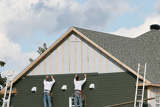 Professional Siding technician working in West Springfield, VA